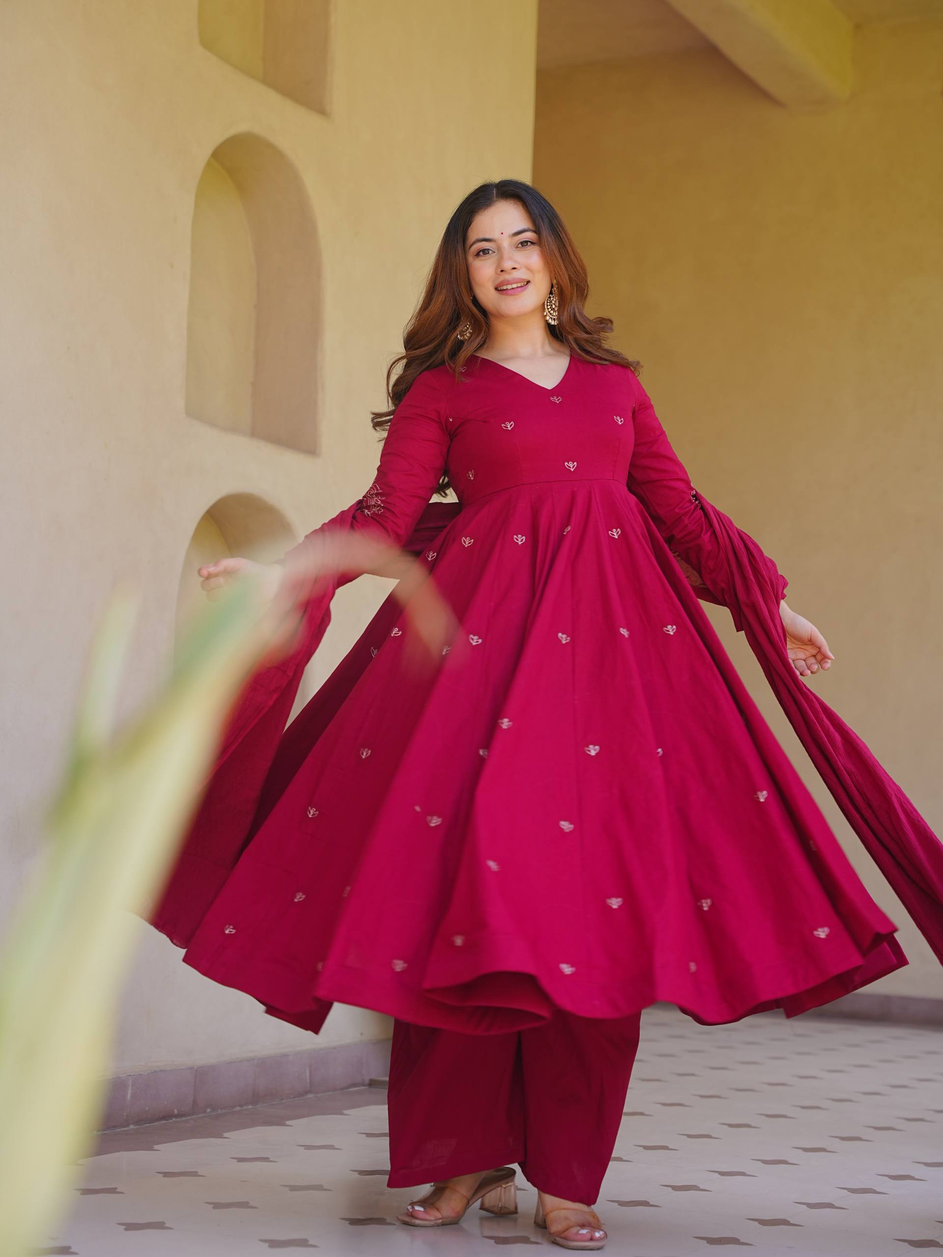 Rich Magenta Maroon Flared Anarkali Suit Set Adorned with Delicate Scattered Floral Embroidery and an Elegant V-Neckline